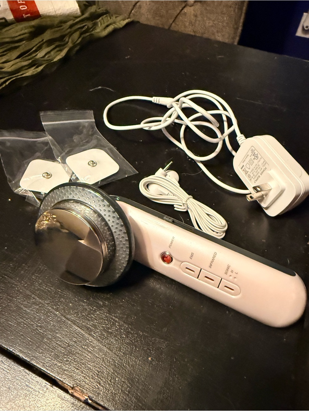White Handheld Ultrasonic Skin Care Device with Charger